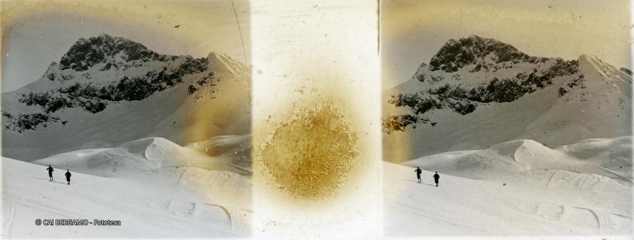 Pizzo Arera con due scialpinisti in salita da Valcanale