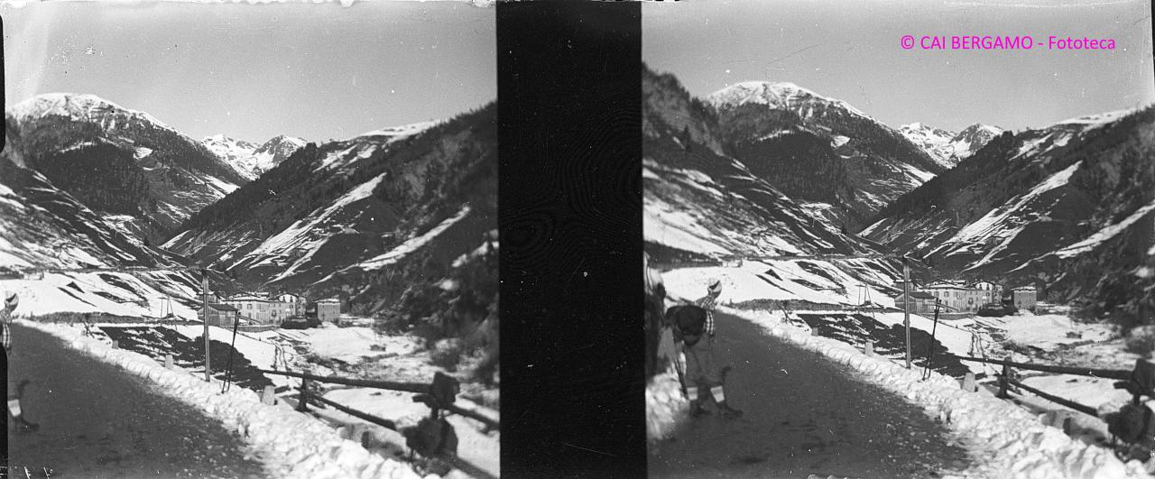 Il vecchio paesino di Valleve con sciatore sulla strada