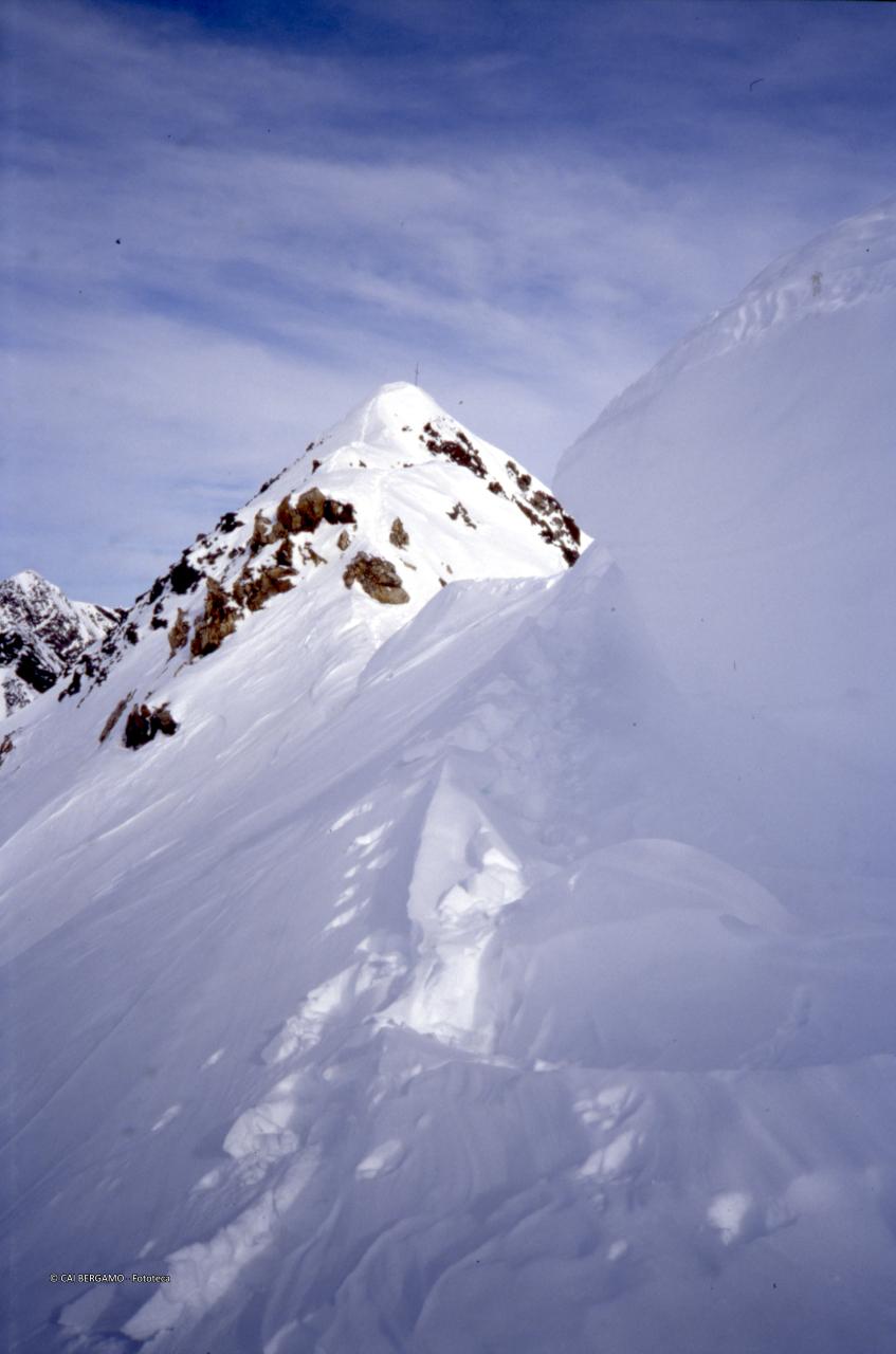 Cima innevata con Piz Ursera ormai vicino